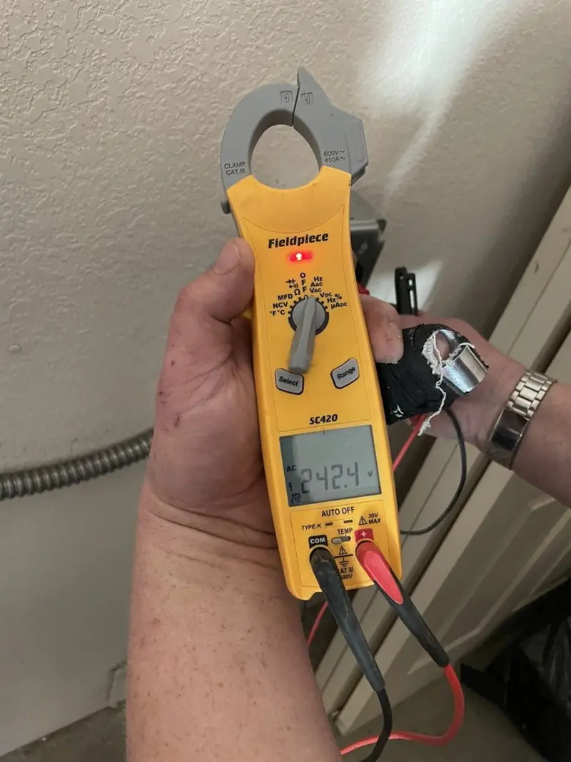 Voltage testing with clamp meter during Hot Tub / Pool Electrical Wiring in Hominy